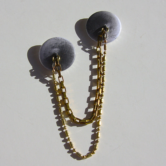 small pair of nipple badges (brass)