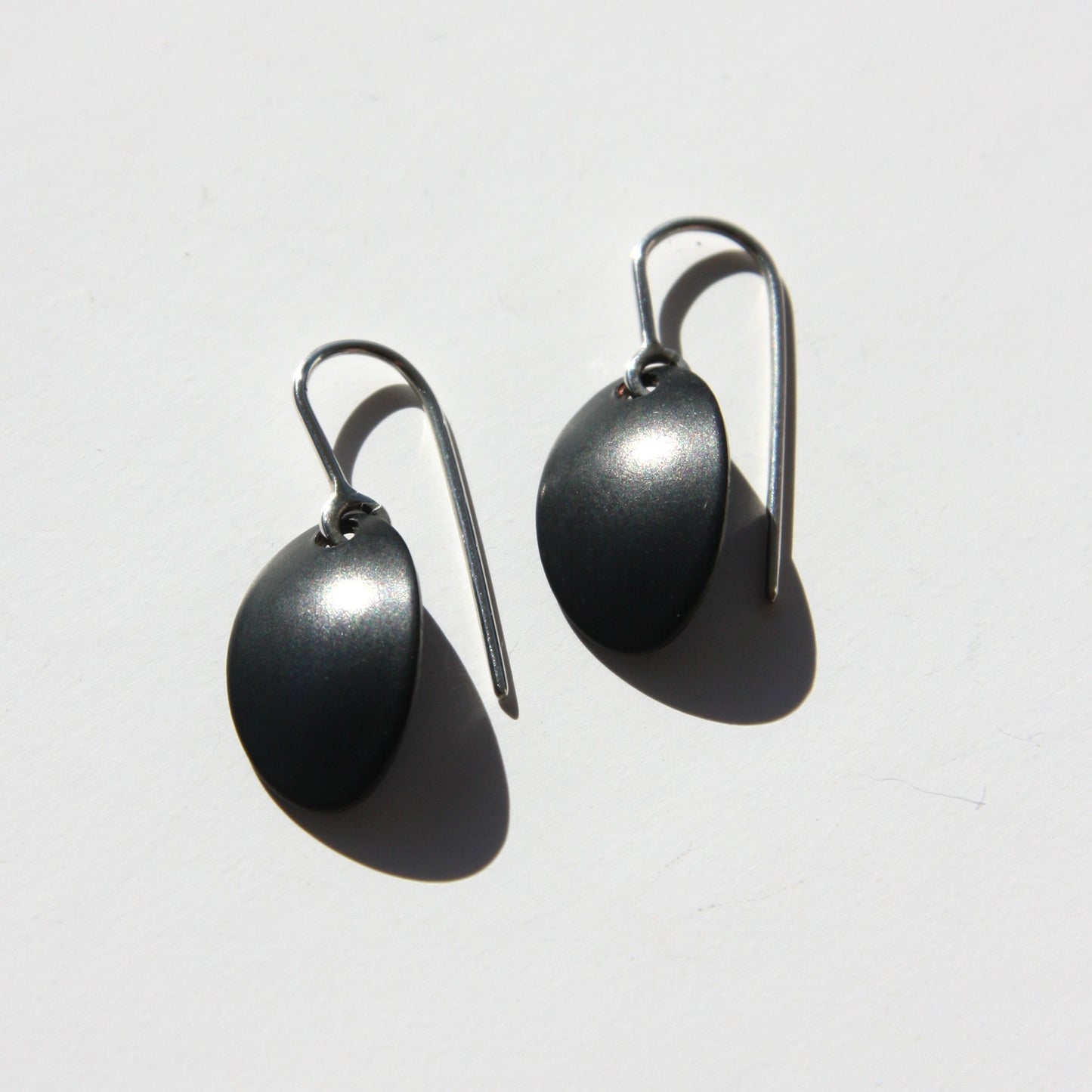 Black chrome oval earrings
