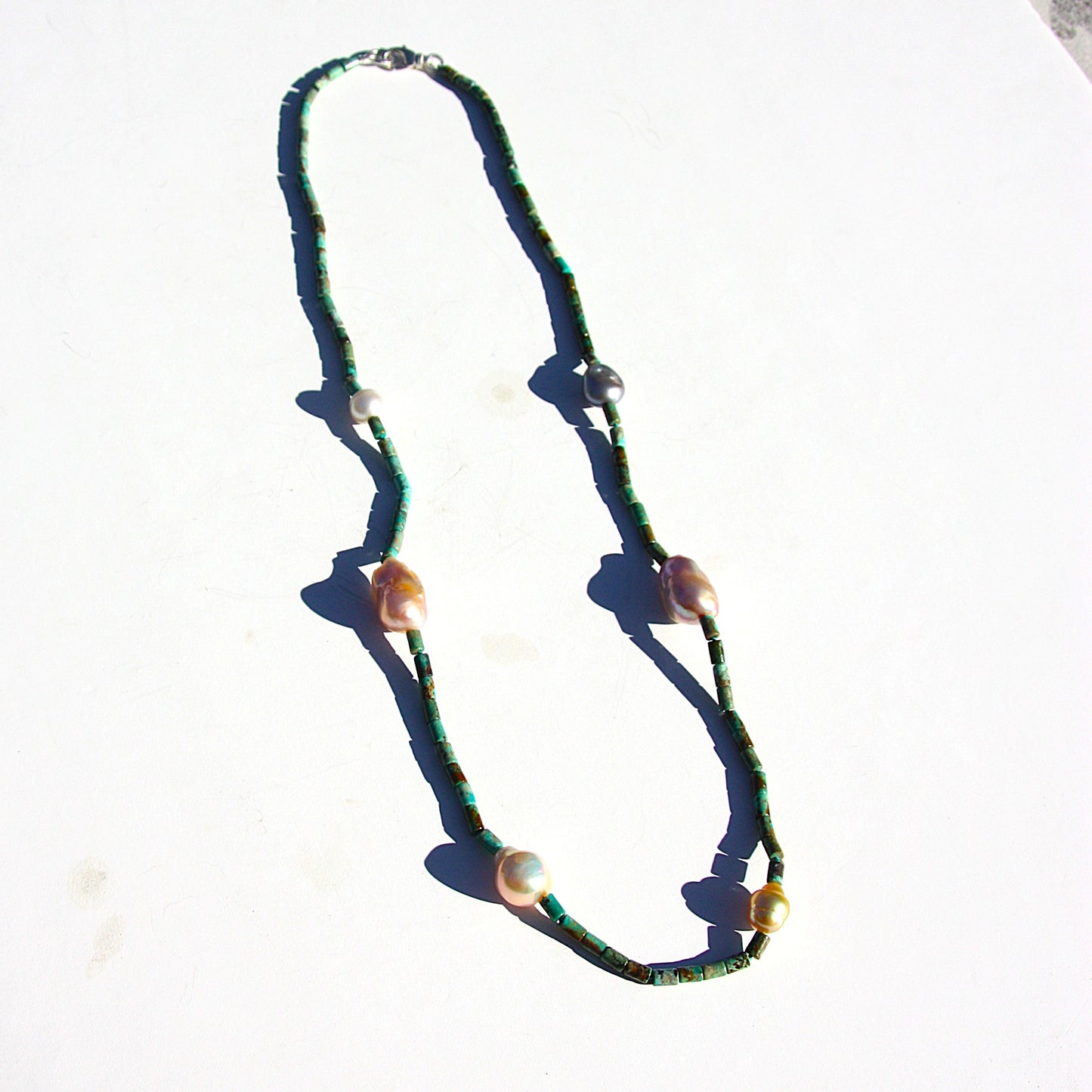 long turquiose and pearl necklace