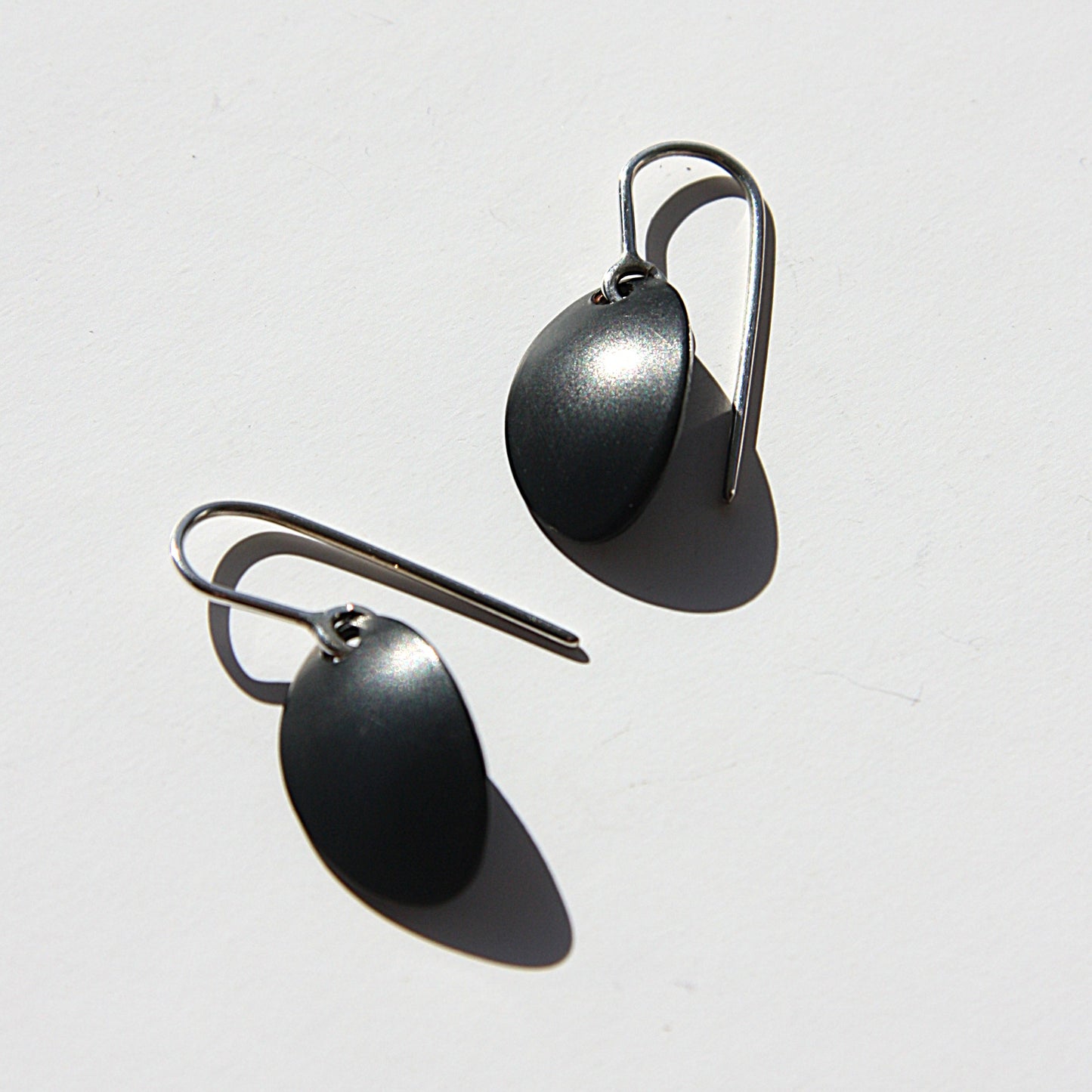 Black chrome oval earrings