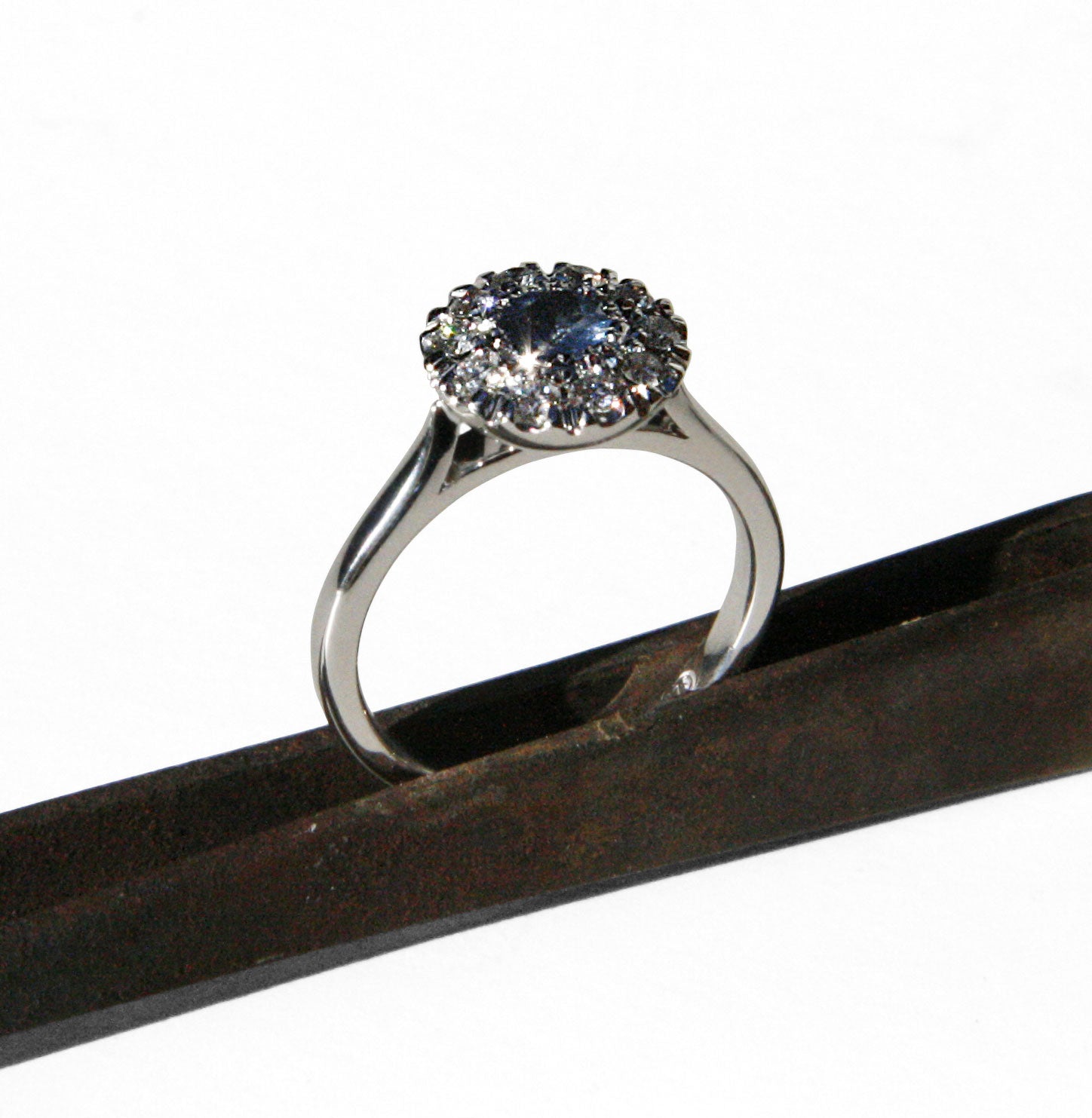 Sapphire and diamond 'button' engagement ring